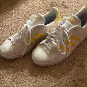 White Adidas SuperStar with Yellow Stripes